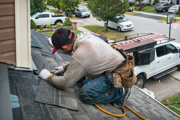 Professional Roofing technician working in Highland Lake, NY